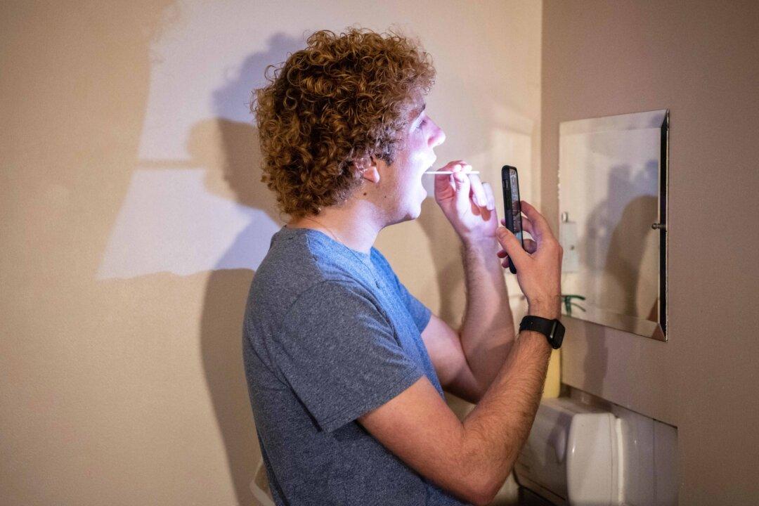 England to Pilot Cutting Self-Isolation Time With Rapid COVID-19 Test