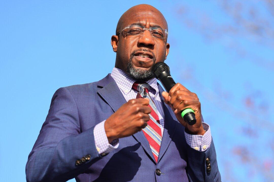 Warnock Staffers Say Georgia Senate Candidate Wants to Defund the Police