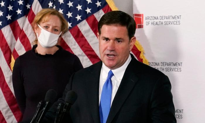 Arizona Governor Threatens to Block School Aid Over Mask Mandates