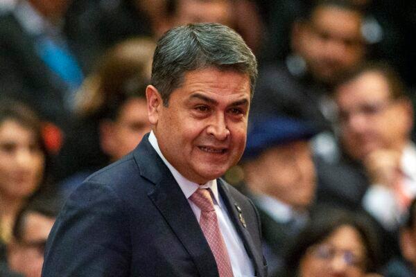 Honduras President Juan Orlando Hernandez arrives for the swearing-in ceremony for Guatemala's new President Alejandro Giammattei at the National Theater in Guatemala City, Guatemala, on Jan. 14, 2020. (Moises Castillo/AP Photo, File)