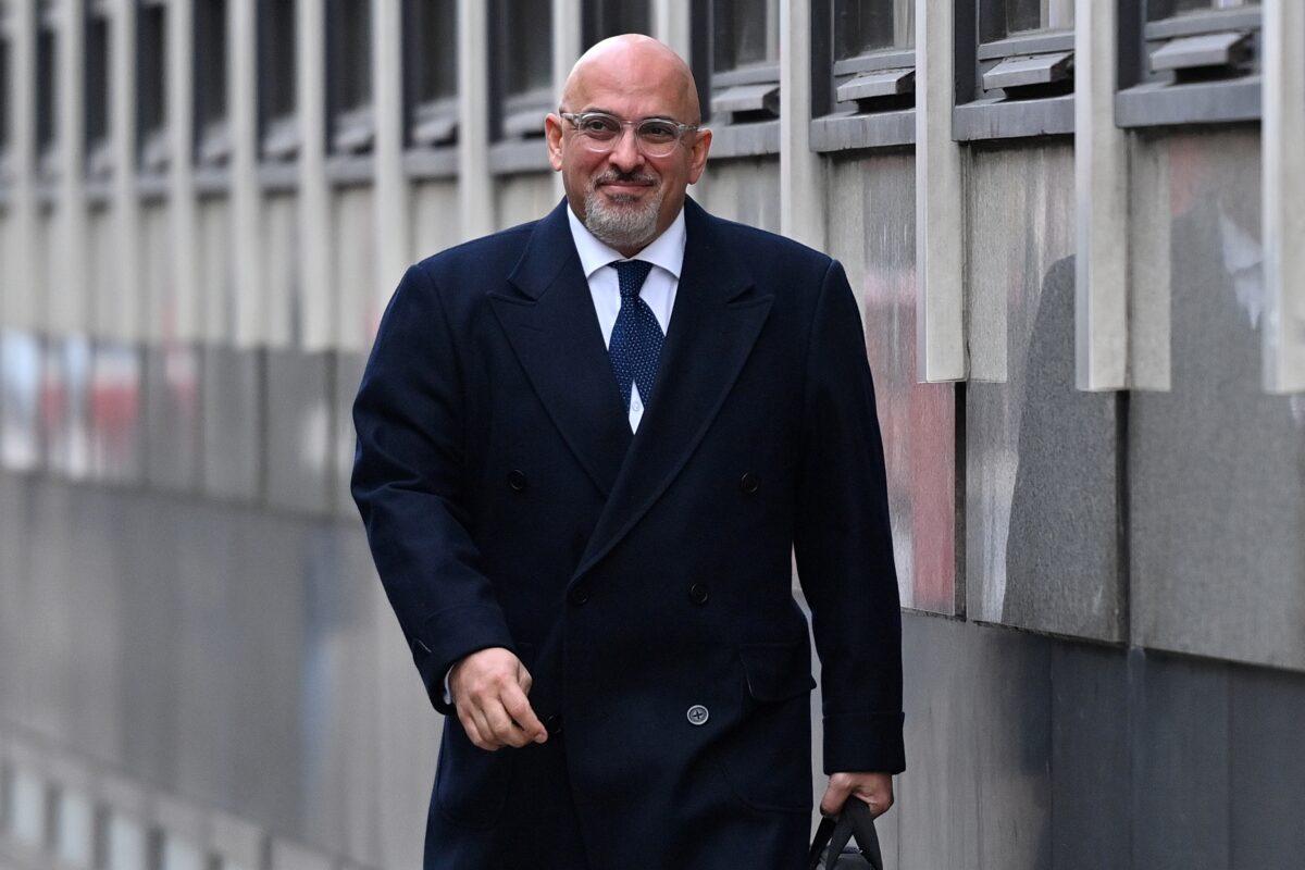 Britain's Parliamentary Under Secretary of State at the Department of Health and Social Care, Nadhim Zahawi, who has responsibility for the deployment of COVID-19 vaccines, walks along a street in Westminster, London on Dec. 2, 2020 (Justin Tallis/AFP via Getty Images)