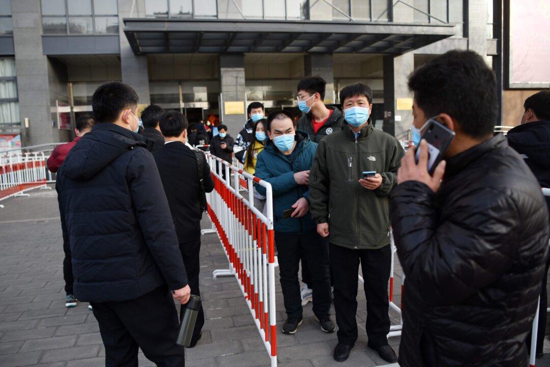 Beijing Imposes Vaccination Quotas on Companies, Schools: Leaked Document