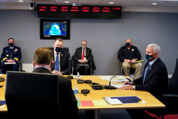 Vice President Mike Pence listens during a briefing about the upcoming presidential inauguration of President-elect Joe Biden and Vice President-elect Kamala Harris, at FEMA headquarters in Washington on Jan. 14, 2021. (Alex Brandon/AP Photo)