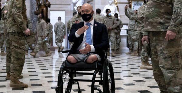 Rep. Brian Mast (R) (C) gives members of the National Guard a tour of the U.S. Capitol on January 13, 2021 in Washington, D.C. (Photo by Stefani Reynolds/Getty Images)