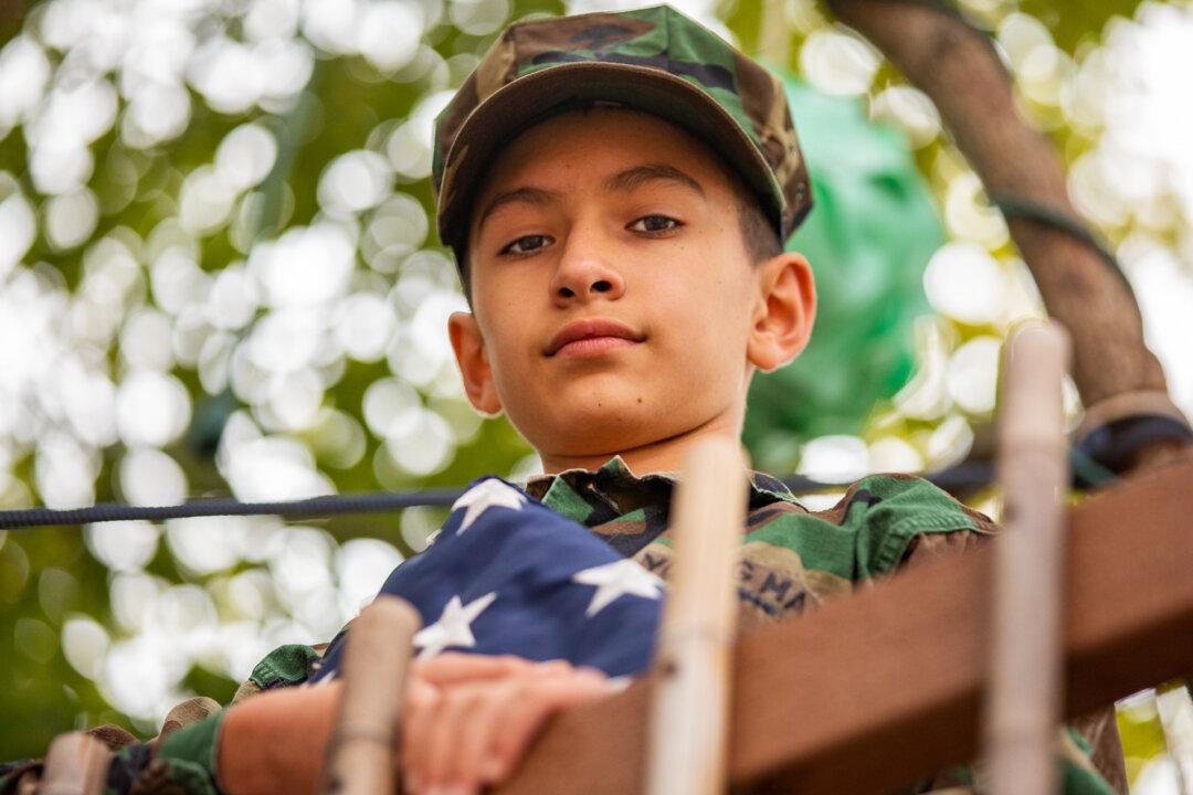 Flag-Carrying 11-Year-Old Takes Big Steps to Thank Law Enforcement