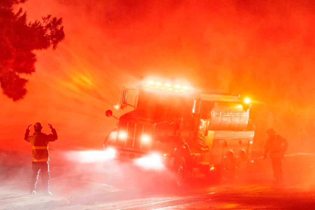 Fierce California Winds Fan Fires, Topple Trees and Trucks