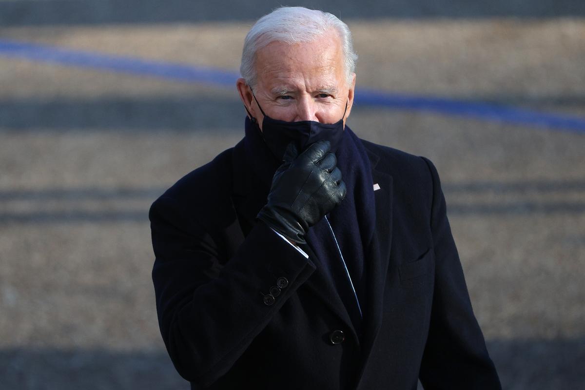 Biden Mandates Masks, Rejoins Paris Climate Accord, Among Other Executive Actions on First Day in Office