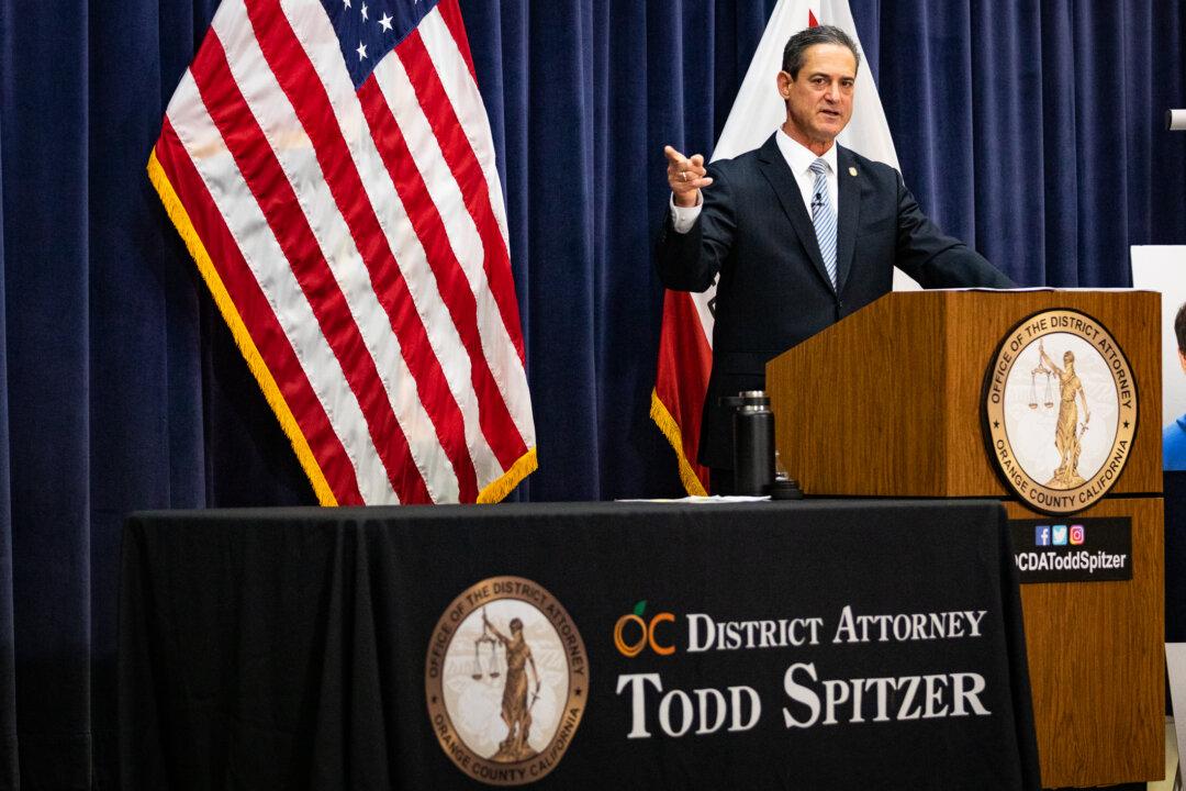 Spitzer Blasts Lawsuit Against DNA Database Program