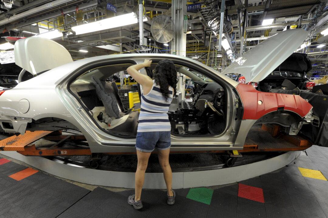 GM Hit by Chip Shortage, to Cut Production at Four Plants