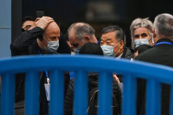Members of the World Health Organization (WHO) team, investigating the origins of the COVID-19, visit the closed Huanan Seafood wholesale market in Wuhan, China's central Hubei Province on Jan. 31, 2021. (HECTOR RETAMAL/AFP via Getty Images)