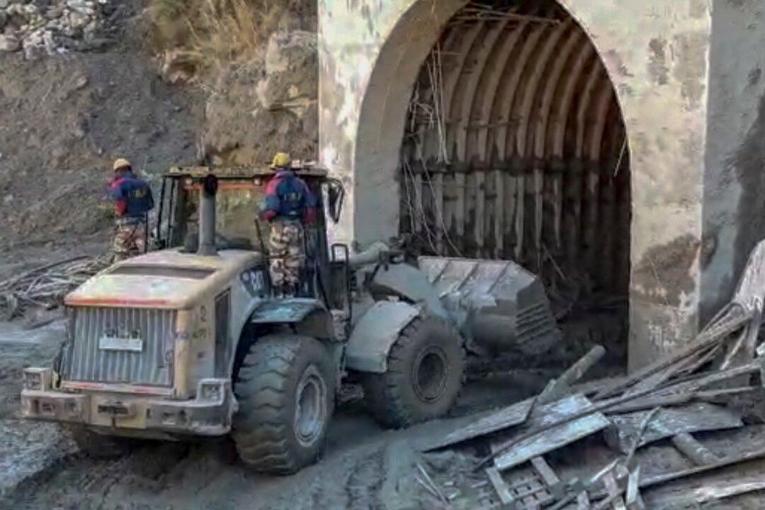 Rescuers in India Digging for 37 Trapped in Glacier Flood