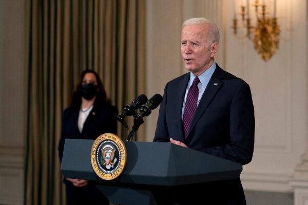 President Joe Biden delivers remarks on the national economy and the need for his administration's proposed $1.9 trillion CCP virus relief legislation with Vice President Kamala Harris in the State Dining Room at the White House in Washington on Feb. 5, 2021. (Stefani Reynolds/Pool/Getty Images)