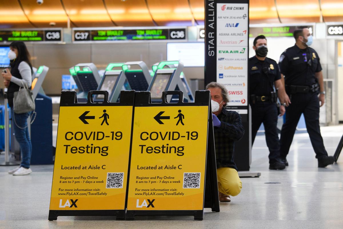 Biden Administration Drops Key COVID-19 Requirement for Air Travel