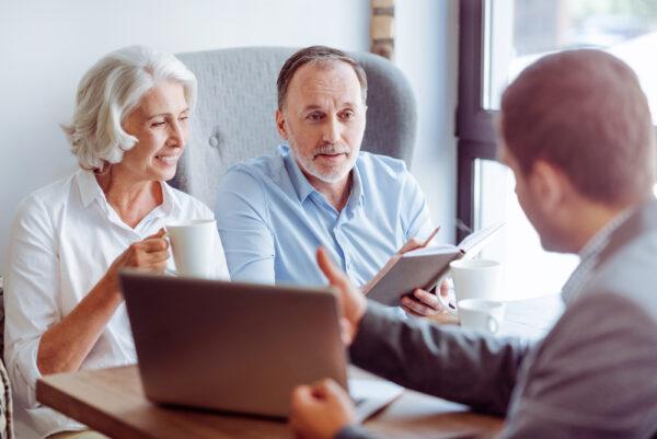 Talk with a life insurance broker to choose the right company and policy for you. (Yakobchuk Viacheslav/Shutterstock)
