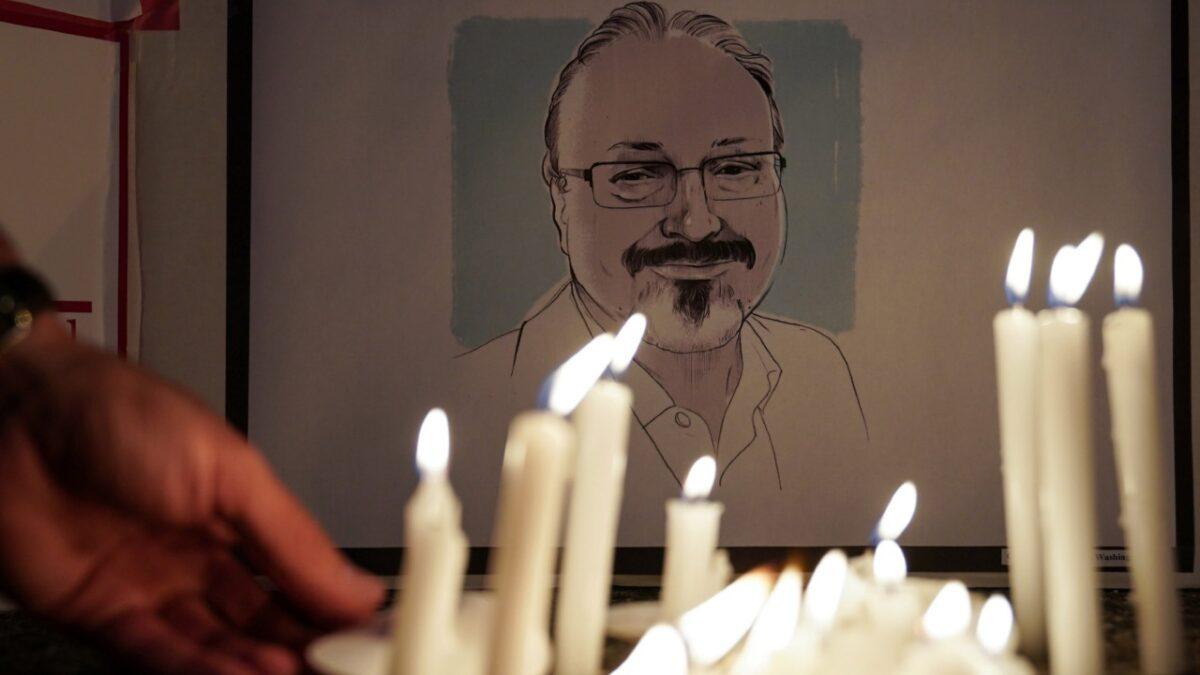 The Committee to Protect Journalists and other press freedom activists hold a candlelight vigil in front of the Saudi Embassy to mark the anniversary of the killing of journalist Jamal Khashoggi at the kingdom's consulate in Istanbul, Turkey, on Oct. 2, 2019. (Sarah Silbiger/Reuters)
