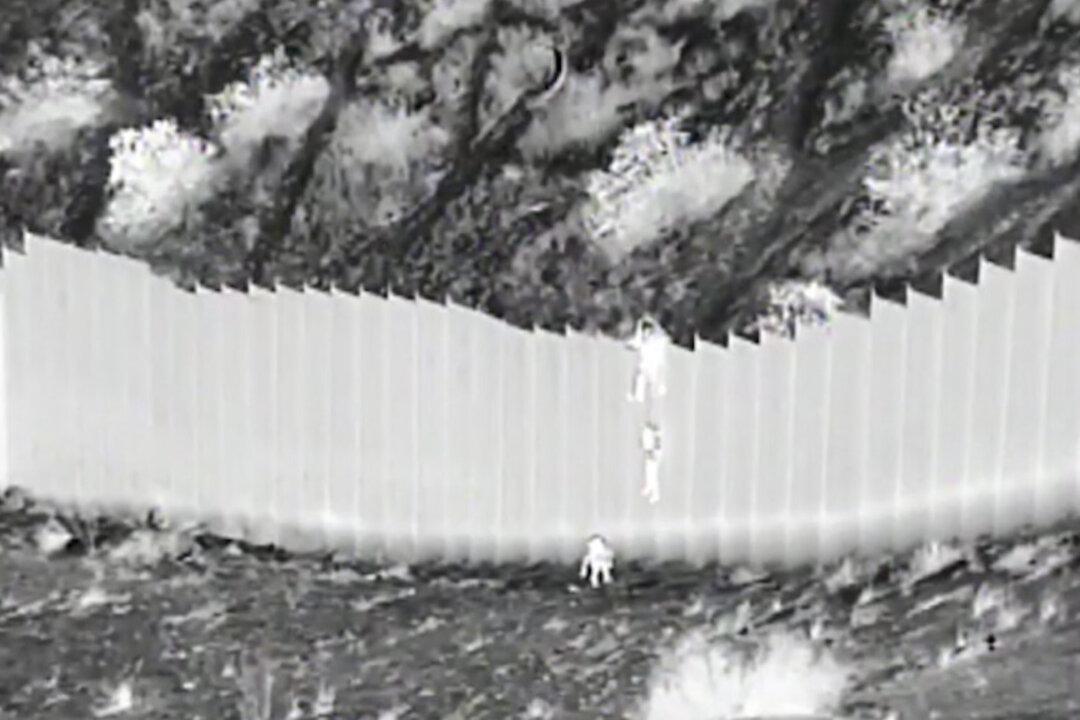 Girls Dropped Over Border Wall by Smugglers Reunited With Family