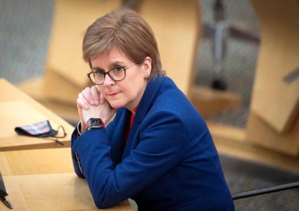Scotland's First Minister Nicola Sturgeon attends a COVID-19 briefing at the Scottish Parliament in Holyrood, Edinburgh, Scotland, on March 2, 2021. (Jane Barlow/PA Wire/Pool via Reuters)