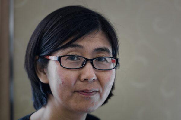 Wang Yu, human rights lawyer, poses during an interview in Hong Kong on March 20, 2014. (Philippe Lopez/AFP via Getty Images)
