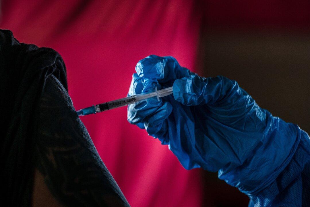 China Offers to Vaccinate Olympians Against COVID-19