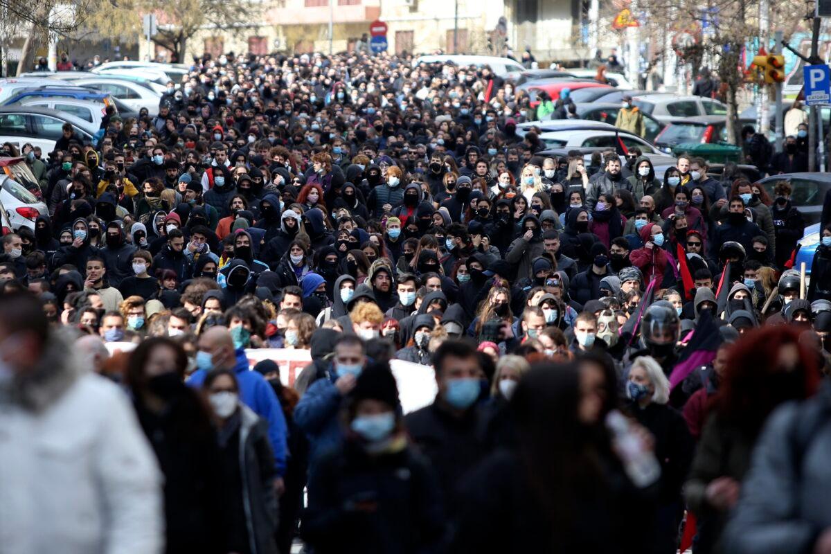 Protesters take part in a rally in the northern city of Thessaloniki, Greece, on March 11, 2021. (Giannis Papanikos/AP Photo)