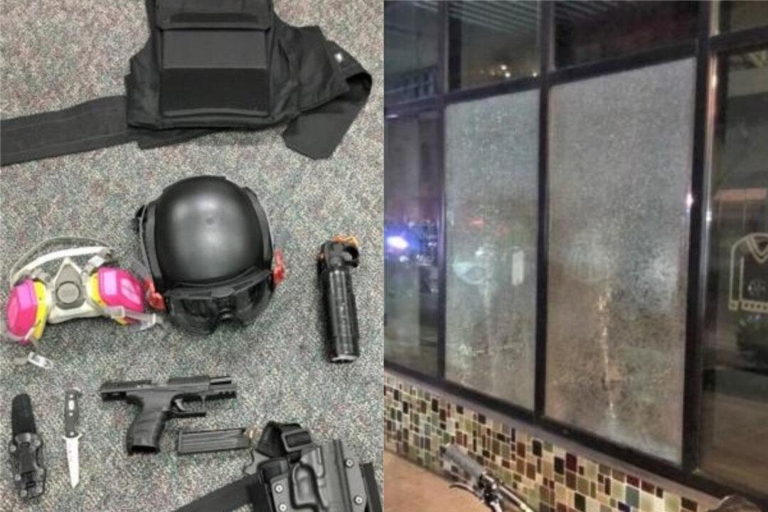 Portland Police Surround 100 Rioters After Group Smashes Windows Downtown