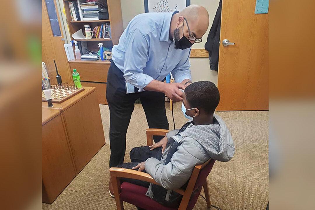 Principal Fixes 8th-Grade Student’s Haircut After He Refused to Take off His Hat at School