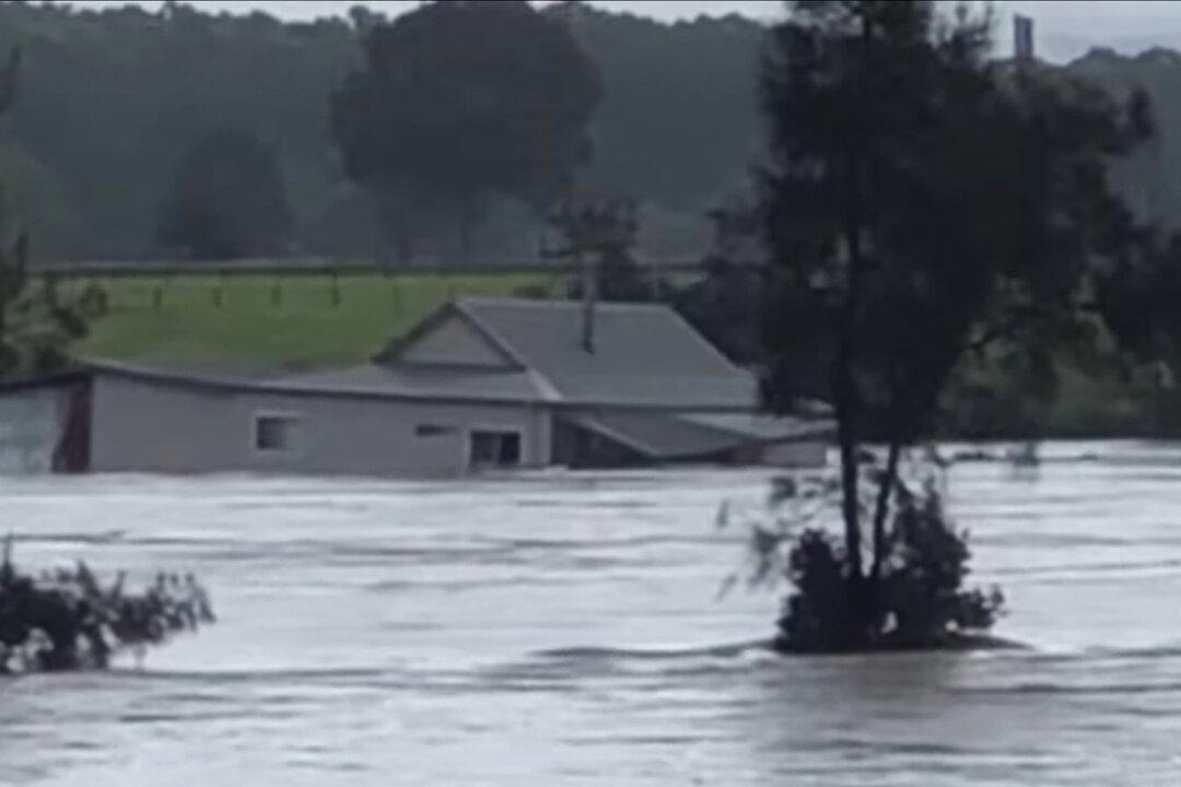 House Swept Down NSW River in Australia