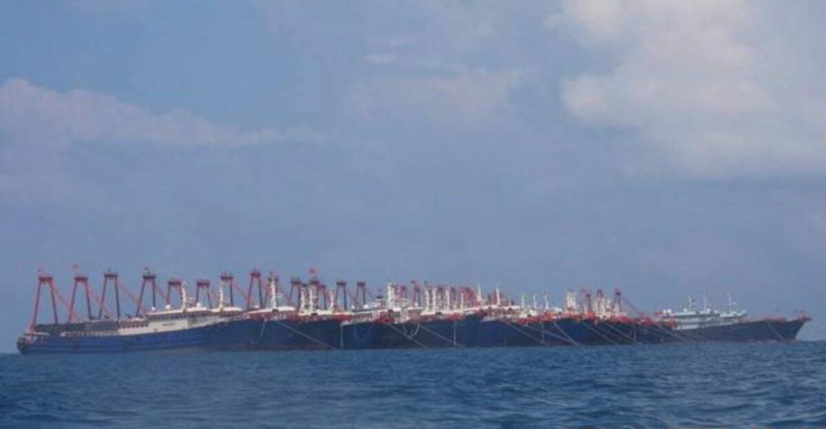 Some of the 220 Chinese vessels are seen moored at Whitsun Reef, South China Sea, on March 7, 2021. The Philippine government expressed concern after spotting more than 200 Chinese fishing vessels it believed were crewed by militias at a reef claimed by both countries in the South China Sea, but it did not immediately lodge a protest. (Philippine Coast Guard/National Task Force-West Philippine Sea via AP)