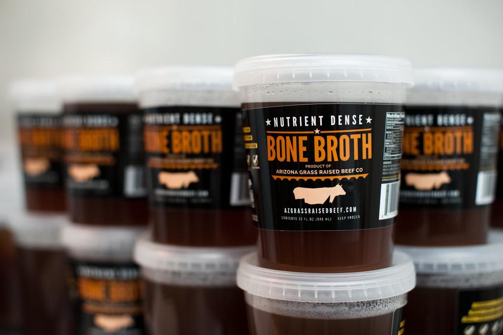 Packaged quarts of nutrient-dense bone broth, products of the Arizona Grass Raised Beef Company (AZ Grass Ra/The Epoch Times)