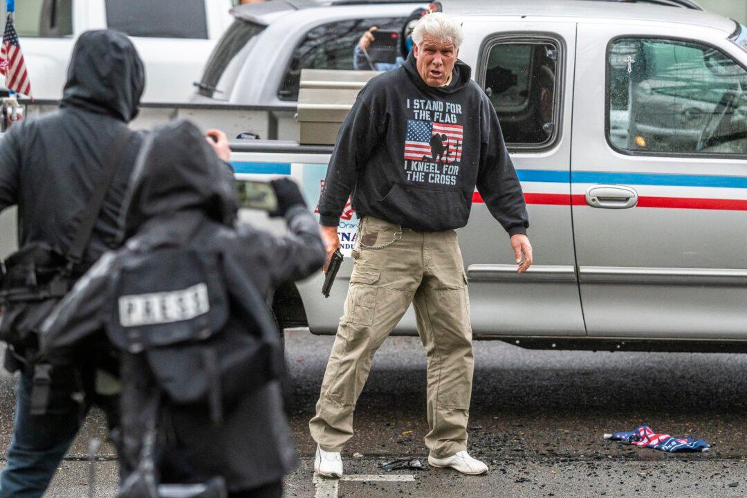 Man Who Displayed Gun at Antifa Protest Was a Victim, Police Say