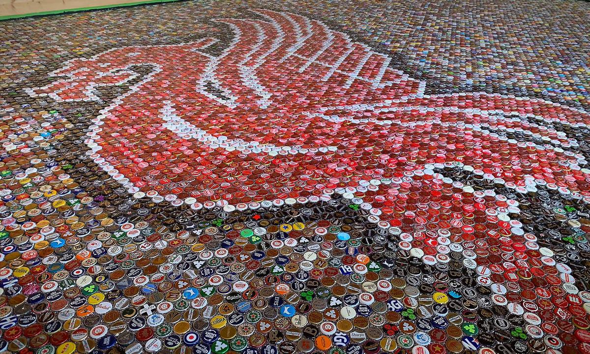 Liverpool Fan Creates Liver Bird Floor Mosaic out of 25,000 Beer Bottle Caps for Bar Floor