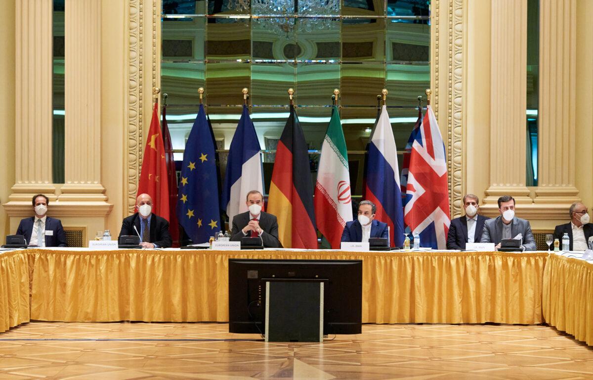 In this handout, Representatives of the European Union (L) and Iran (R) attend the Iran nuclear talks at the Grand Hotel in Vienna, Austria, on April 6, 2021. (EU Delegation in Vienna via Getty Images)