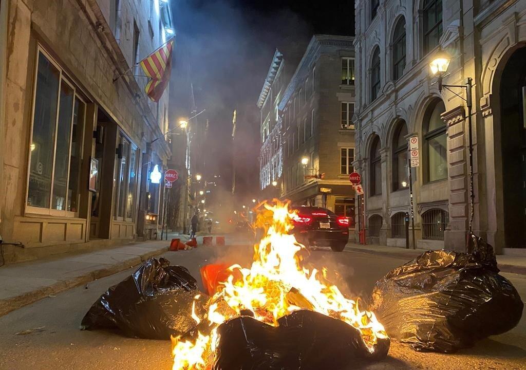 Montreal Businesses Clean Up After Anti-Curfew Protest Mayhem