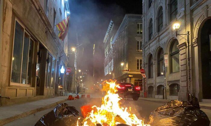 Montreal Businesses Clean Up After Anti-Curfew Protest Mayhem