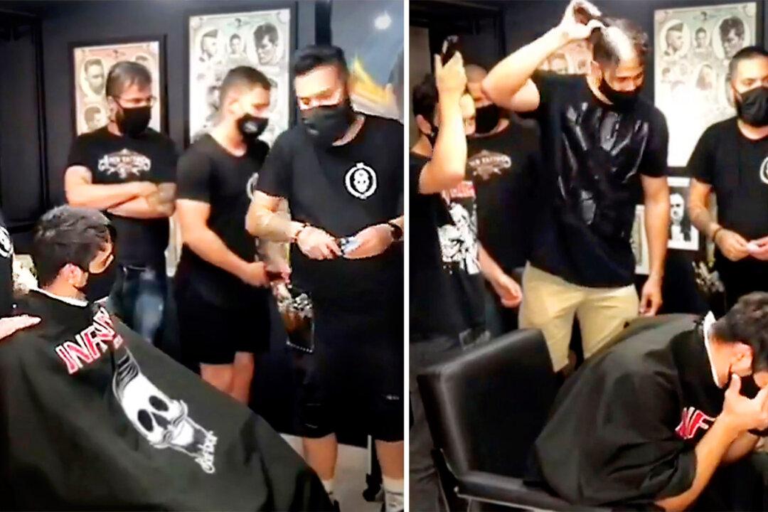 Video Shows Cancer Patient’s Reaction at Barbershop When Staff Unexpectedly Shave Their Heads