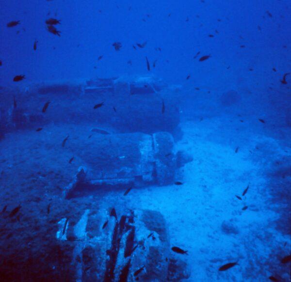 A Boeing B-17 Flying Fortress, a 1930s U.S. Army Air Corps bomber, lays underwater off the coast of Calvi, Corsica. (Courtesy of John Christopher Fine)