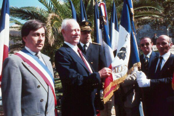 Lt. Armand C. Sedgeley (2nd L) at a ceremony commemorating World War II, in Corsica in 1995. (Courtesy of John Christopher Fine)