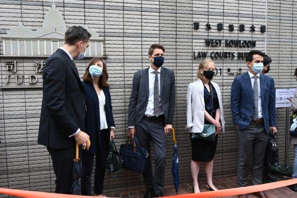 (L-R) Consular representatives from Australia, Canada, Sweden, France, and the Netherlands, outside of the West Kowloon Courts Building in Hong Kong on April 16, 2021. (Sung Pi-lung/The Epoch Times)
