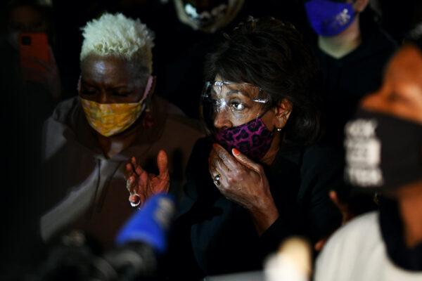 Rep. Maxine Waters (D-Calif.) joins demonstrators in a protest outside the Brooklyn Center police station in Brooklyn Center, Minn., on April 17, 2021. (Stephen Maturen/Getty Images)