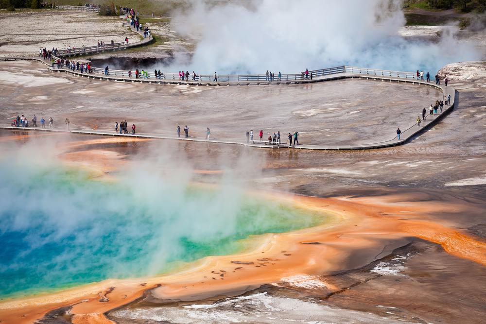 Visitors at the Grand Prismatic Spring. (Berzina/Shutterstock)