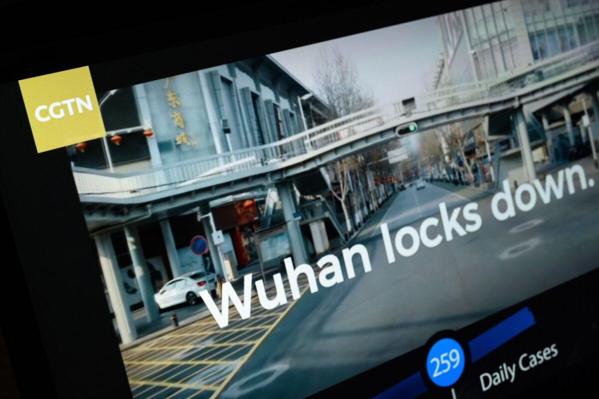Scenes from a program from the CGTN archive are displayed on a computer monitor in London, England, on Feb. 4, 2021. (Leon Neal/Getty Images)