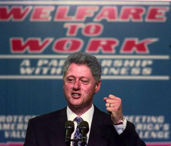 President Bill Clinton clinches his fist during a 27 October speech on welfare reform at Vanderbilt University Medical Center in Nashville, Tennessee.<br/>(Paul J. Richards/AFP via Getty Images)