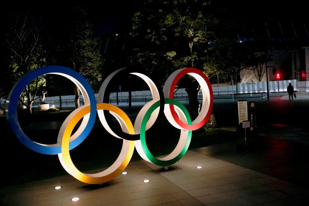 Japan Says Olympics Must Not Burden Medical Systems