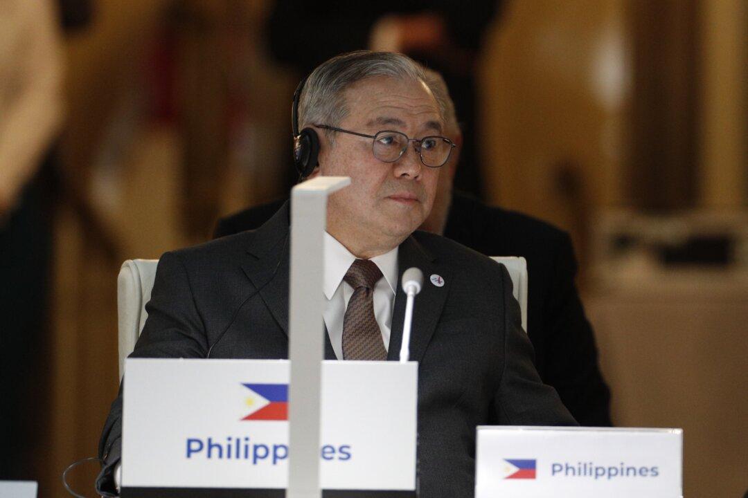 Philippine Foreign Minister Issues Expletive-Laced Tweet Over China Sea Dispute