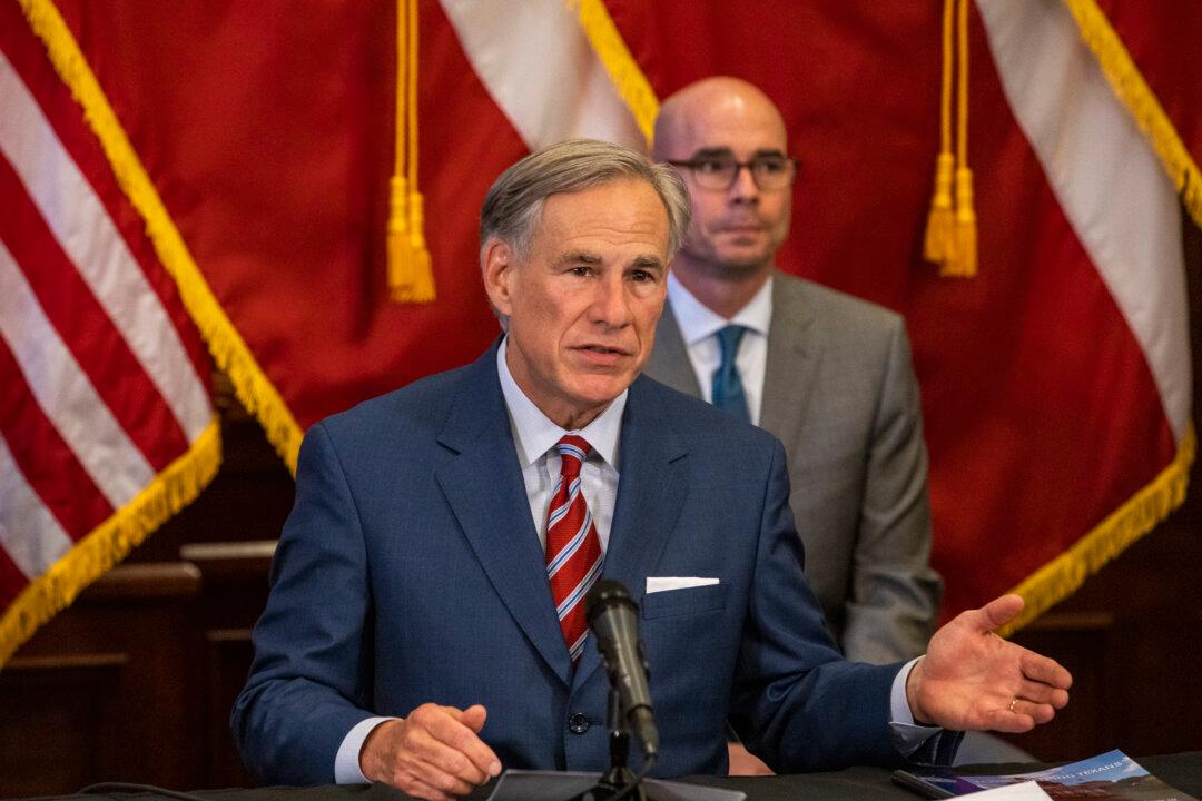 Texas Gov. Abbott Says He'll Take Action Against Cities That Try to Defund Police