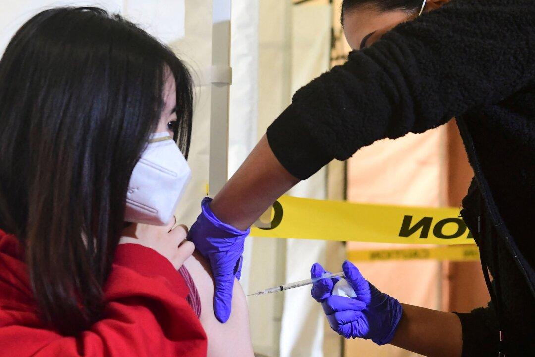 CDC Panel Endorses Pfizer Vaccine for Adolescents as Young as 12