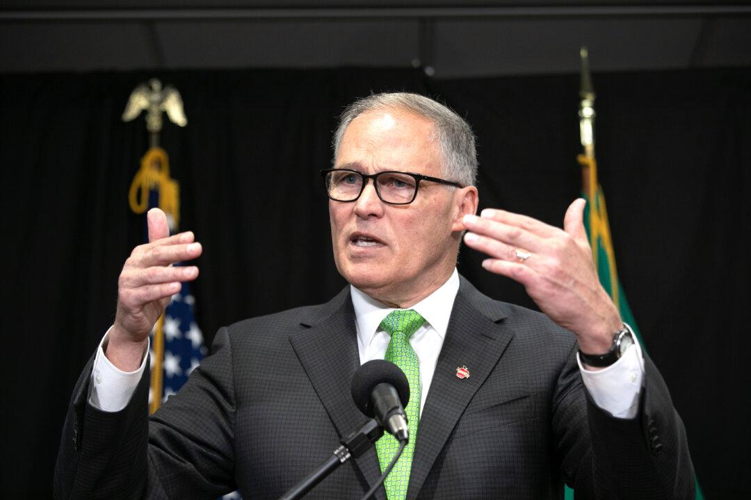 Washington State Troopers, Firefighters Sue Governor Over Vaccine Mandate