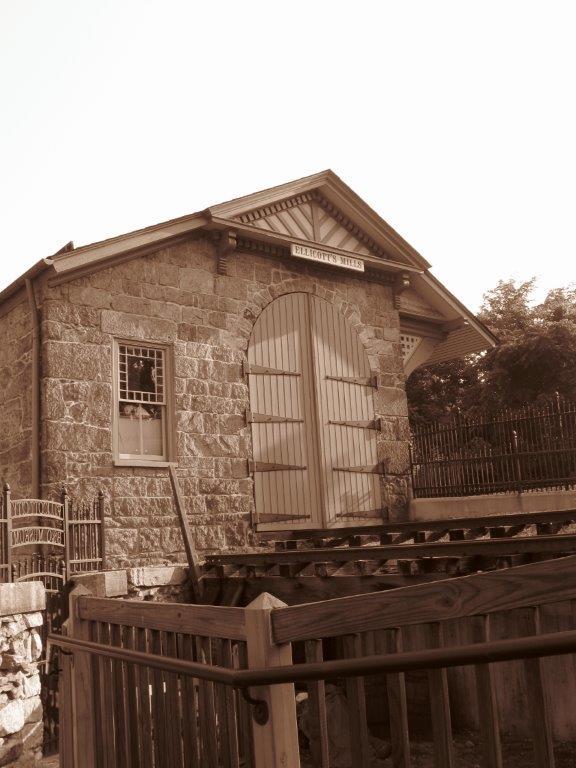 The first station built by the B&O was also an engine house. The Roman arched door allowed the smaller steam engines of the day to be brought into the building. (Bob Kirchman)