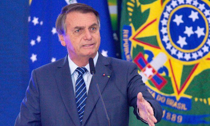 Brazilian President Bolsonaro Leaves Hospital, Says Will Be Back at Work Monday