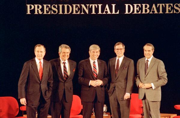 Republican presidential candidates, Vice President George Bush, from left, Pat Robertson, Rep. Jack Kemp, Pierre "Pete" du Pont and Senator Bob Dole pose before starting their last debate before the primary in Goffstown, N.H., on Feb. 14, 1988. (Jim Cole/AP Photo)